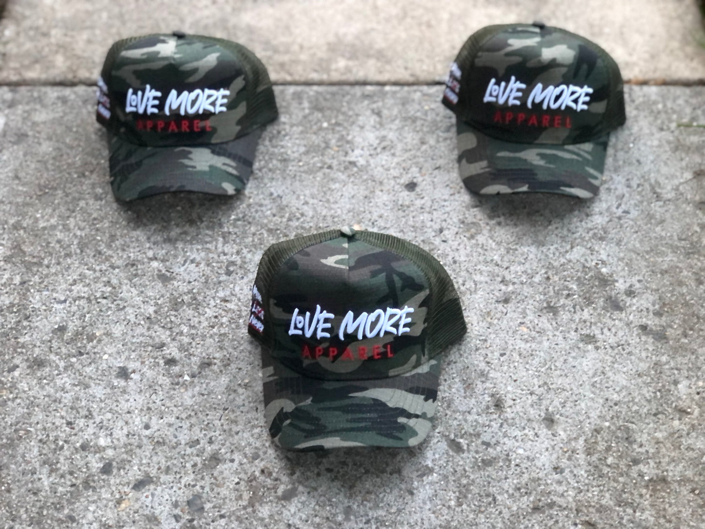 Camouflage “Signature” Trucker Hat