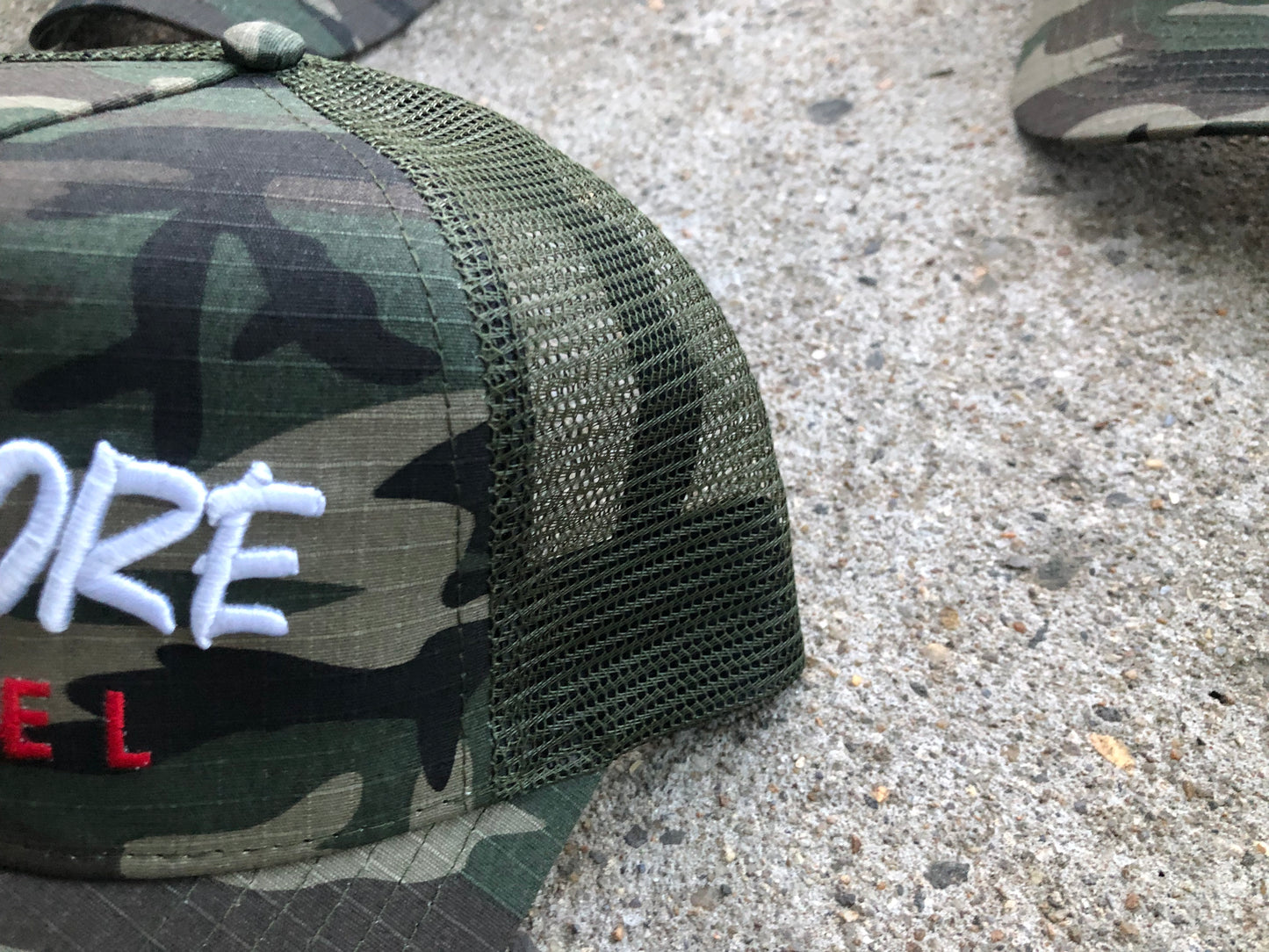 Camouflage “Signature” Trucker Hat