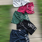 Mesh “Abbreviation” Shorts